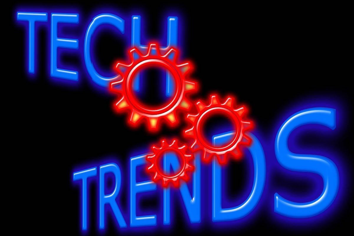 Tech Trends as blue neon sign with three red cogs.jpeg